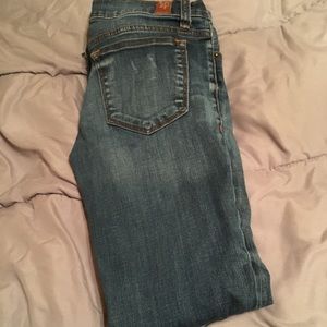 Distressed cropped skinny jeans